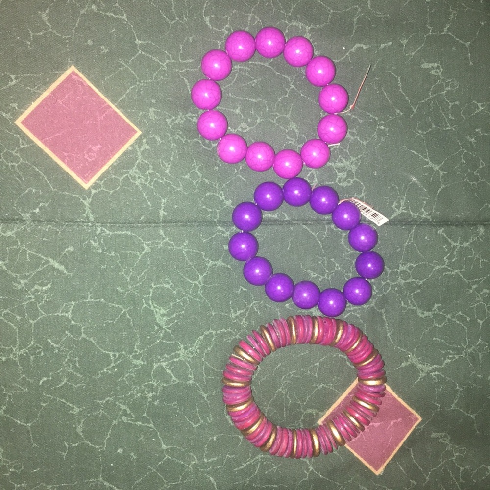 3 purple bracelets